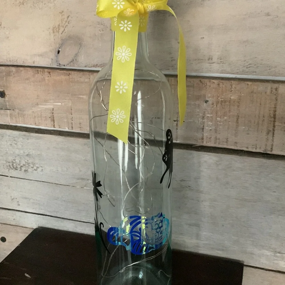 Iridescent Cheshire Cat wine bottle lantern